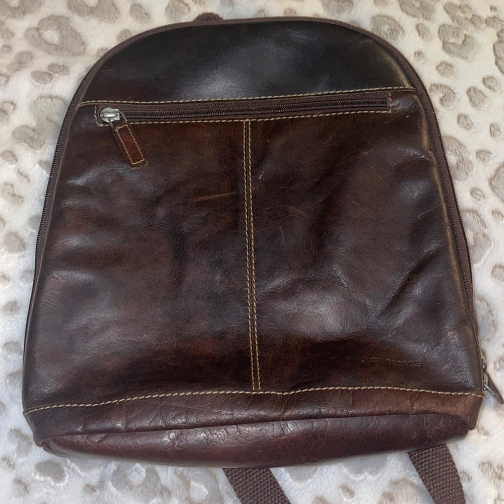 Beautiful leather jack George’s purse backpack great condition